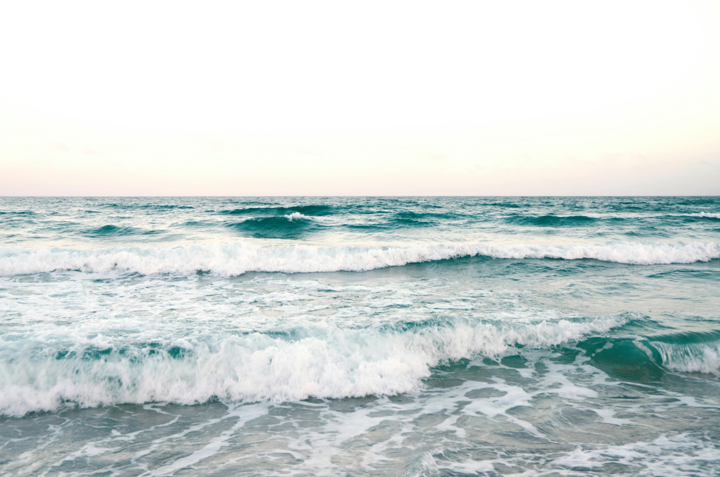 Sunlight over the turquoise Atlantic surf on the North Florida coast